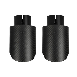 Exhaust tips pair in matte black carbon finish, rear view.