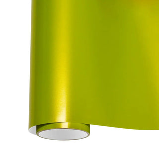 Roll of lime green car sticker film showing glossy finish and flexibility.