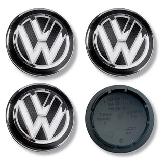 Top view of VW alloy wheel centre caps showing front and back sides.